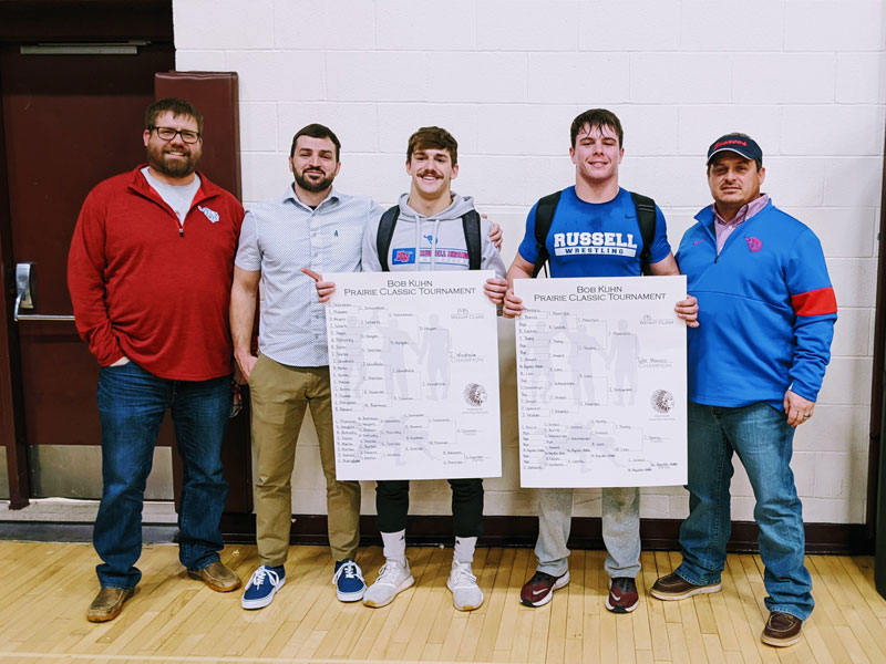 L to R: Russell assistant and head coaches Luke Keller and Dan Weigel, wrestlers Jacob Windholz and Tyler Moresco, and RHS assistant coach Jason Pfeifer. (Photo courtesy of Mandy Trout)