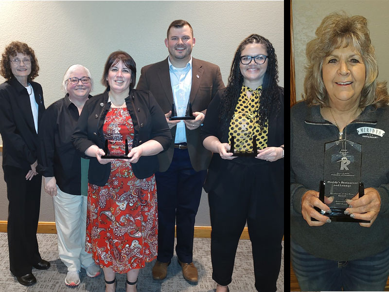 L to R: Chamber Director of Member Services Lisa Moubry, Past Chamber Board President Linda Crowder, Citizen of the Year Andrea Garland, Community Service Award Recipient Andrew Ochampaugh, Non-Profit of the Year Recipient Russell Public Library and Jessica McGuire, and Business of the Year Recipient Meridy's Restaurant and Meridy Barnes.