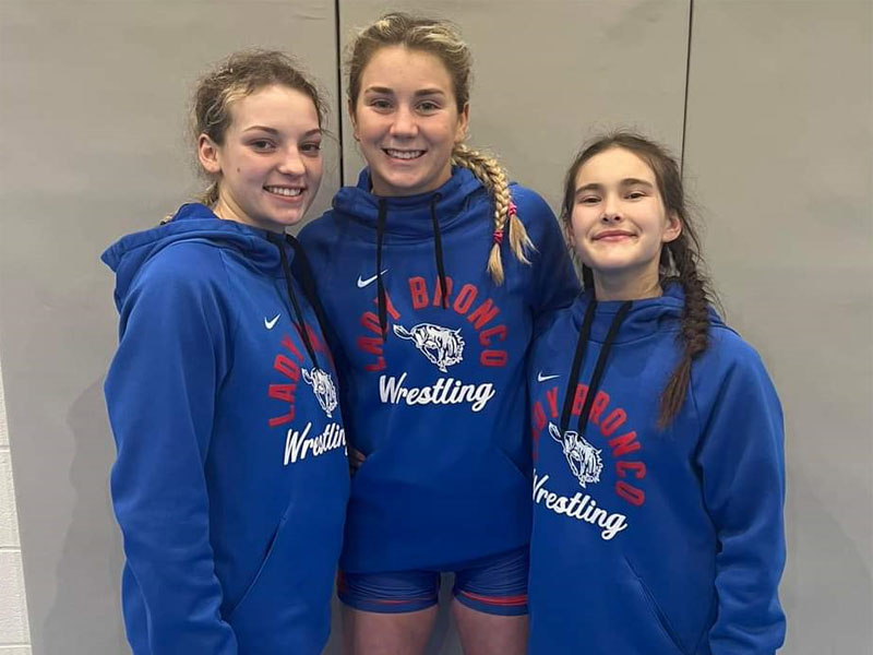 Kinsey Zorn, Jaden Ney and Mya Trevino (L to R) all qualified after finishing in the top four of their weight division at the Scott City Regional on Saturday, February 10. (Photo from RHS Lady Bronco Facebook Page)