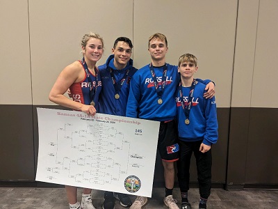 From left: Russell-Sylvan-Lucas Wrestlers Jaden Ney, Teagen Pfeifer, Brayden Suchy and Xzephren Donner pose for a picture after the State Wrestling Tournament in Salina on Saturday, February 24.  Ney won the 145-pound Class 4-1A State title, Pfeifer finished 2nd at 165 pounds in Class 3-2-1A while Suchy and Donner both placed 3rd. (Photo courtesy of Jason Pfeifer).